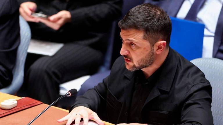 Ukraine's President Volodymyr Zelensky attends a United Nations Security Council minesterial meeting on Ukraine at UN headquarters in New York on September 23, 2025. - Charly Triballeau/Pool/AFPPIX