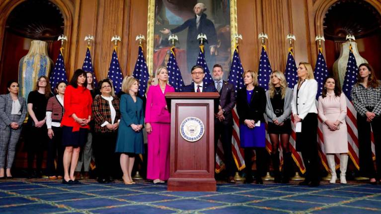 Speaker of the House Mike Johnson (R-LA) (C) speaks at a news conference following the House of Representatives vote on H.R. 28 - “Protection of Women and Girls in Sports Act” at the U.S. Capitol - AFPpix