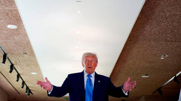 U.S. President Donald Trump speaks as he visits the Abrahamic Family House during the final stop of his Gulf visit, in Abu Dhabi, United Arab Emirates, May 16, 2025. - REUTERSPIX