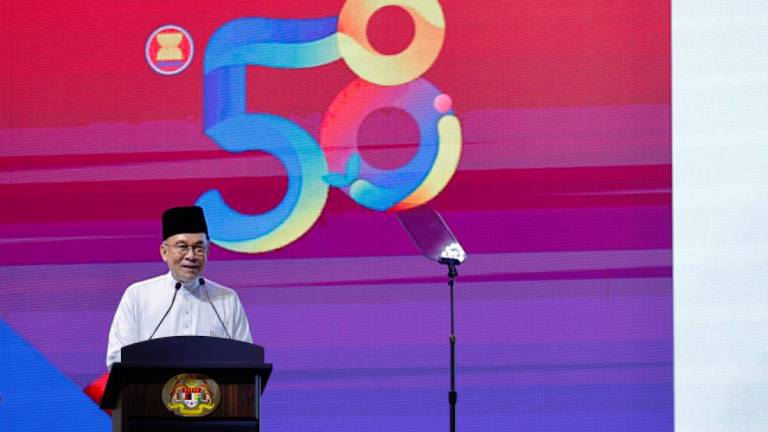 Anwar delivering his speech during the 58th Asean Day celebration 2025 in Cyberjaya. – BERNAMApix