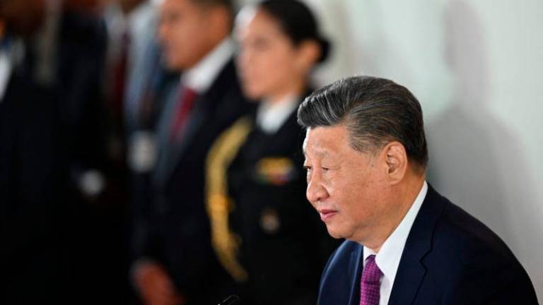 China’s President Xi Jinping (R) attends a meeting with Peru’s President Dina Boluarte at the government palace in Lima on November 14, 2024, on the sidelines of the Asia-Pacific Economic Cooperation (APEC) Summit. - AFPPIX