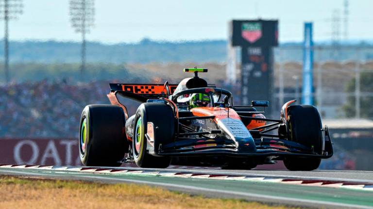 Oct 17, 2025; Austin, TX, USA; McLaren Formula 1 driver Lando Norris (4) of Team Great Britain drives during qualifying for the Sprint race in the US Grand Prix at Circuit of The Americas Austin. Mandatory Credit: Jerome Miron-Imagn Images via REUTERSPIX
