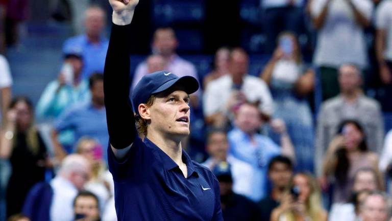 Italy’s Jannik Sinner celebrates after victory over Canada’s Felix Auger-Aliassime during their men's singles semifinal tennis match on day thirteen of the US Open tennis tournament at the USTA Billie Jean King National Tennis Center in New York City, on September 5, 2025. - AFPPIX