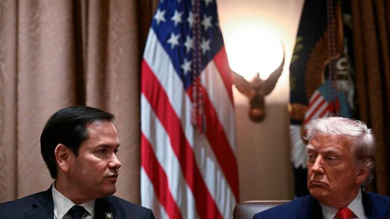FILEpix: US President Donald Trump listens to Secretary of State Marco Rubio. AFPpix