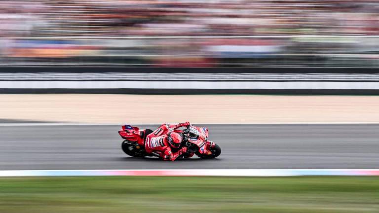 Ducati Lenovo Team's Spanish MotoGP rider Marc Marquez competes during the motorcycle Czech Moto GP Grand Prix sprint race at the Masaryk circuit in Brno, Czech Republic on July 19, 2025. - AFPPIX