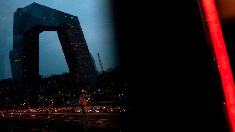 Cars move past central business district (CBD) in Beijing, China August 11, 2025. - REUTERSPIX