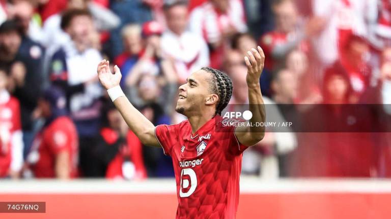 Lille's French midfielder #08 Ethan Mbappe celebrates after scoring his team's second goal during the French L1 football match between Lille LOSC and Toulouse FC at the Stade Pierre-Mauroy in Villeneuve-d'Ascq, northern France, on September 14, 2025. - AFP