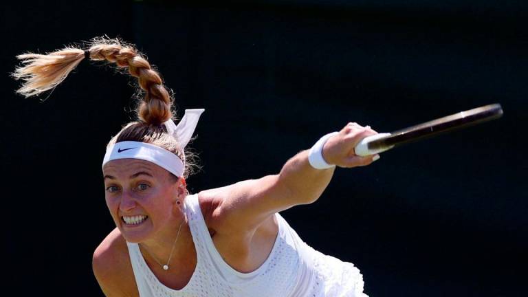 (FILES) Czech Republic’s Petra Kvitova serves to Belarus’ Aliaksandra Sasnovich during their women’s singles tennis match on the fifth day of the 2023 Wimbledon Championships at The All England Tennis Club in Wimbledon, southwest London on July 7, 2023. AFPpix