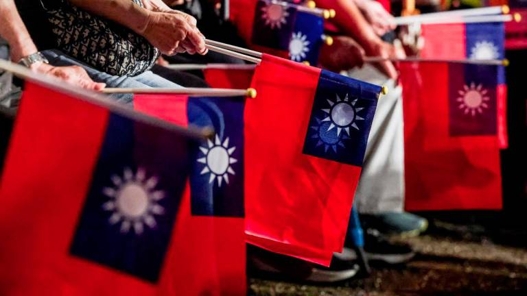 Supporters of Taiwan's main opposition party, Kuomintang (KMT), participate in a rally against the recall election in front of the Presidential Office in Taipei on July 25, 2025. - AFPPIX