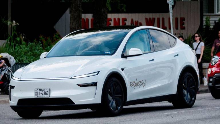 A Tesla robotaxi drives on the street along South Congress Avenue in Austin, Texas, U.S., June 22, 2025. - REUTERSPIX