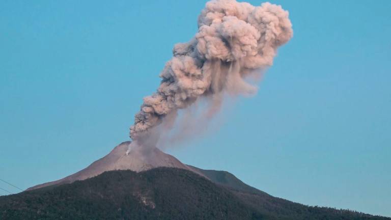 This handout photo taken and released by the Geological Agency of Indonesia on June 2, 2024 shows a volcanic eruption from Mount Lewotobi Laki-laki in East Flores, East Nusa Tenggara. - AFPPIX via Geological Agency of Indonesia