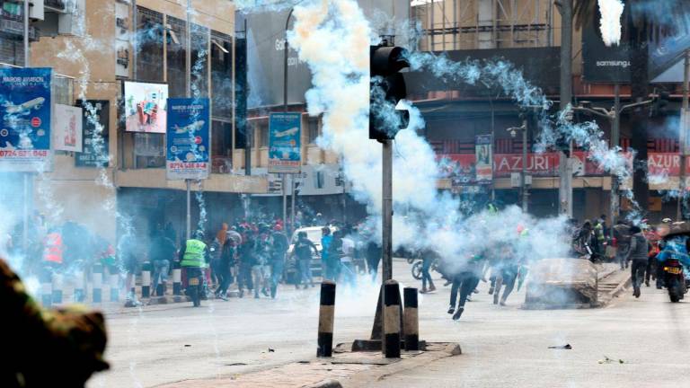 Smoke rises as protestors participate in a demonstration to mark the first anniversary of the 2024 anti-government protests that left more than 60 people dead and drew widespread condemnation over the use of force by security agencies, in Nairobi, Kenya June 25, 2025. - REUTERSPIX