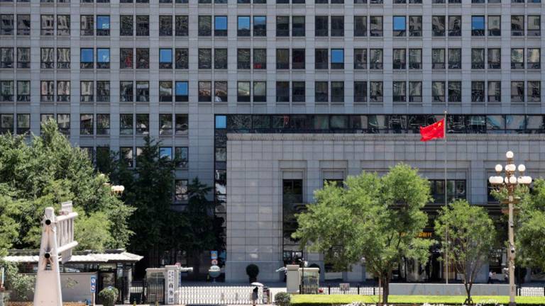 A Chinese flag flutters at the Chinese Ministry of Commerce building in Beijing, China June 4, 2025. - REUTERSPIX