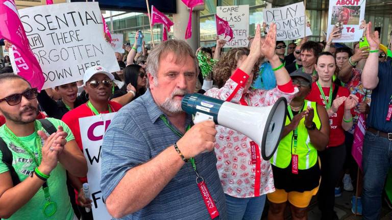 Mark Hancock, National President of the Canadian Union of Public Employees (CUPE), attends a picket line with striking Air Canada flight attendants amid a standoff with a government board that said the stoppage was unlawful, at Toronto Pearson International Airport in Mississauga, Ontario, Canada August 18, 2025. - REUTERSPIX