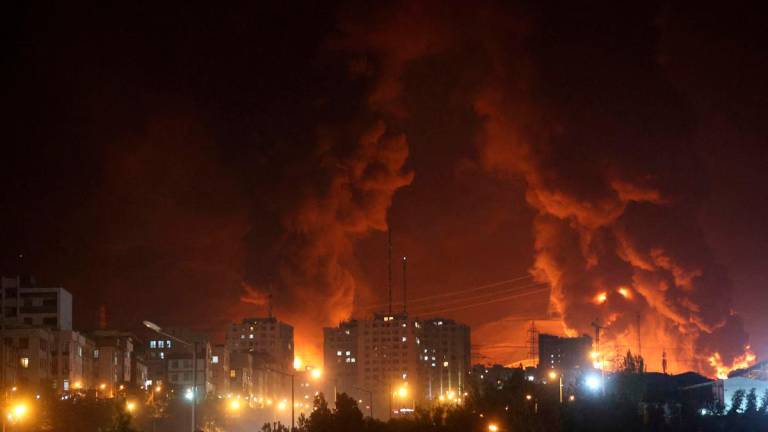 Fire of Israeli attack on Sharan Oil depot is seen following the Israeli strikes on Iran, in Tehran, Iran, June 15, 2025. Majid Asgaripour/WANA (West Asia News Agency) via REUTERS