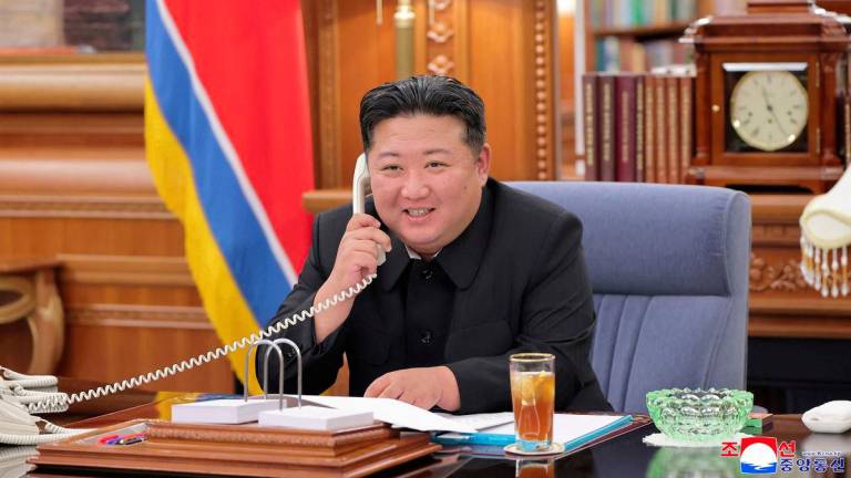North Korean leader Kim Jong Un holds a call with Russian President Vladimir Putin, in Pyongyang, North Korea, in this picture released by the Korean Central News Agency on August 13, 2025. - KCNA via REUTERSPIX