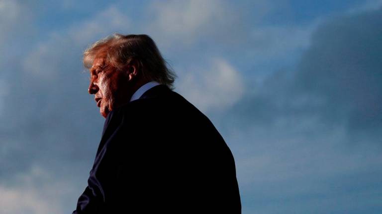U.S. President Donald Trump walks upon his arrival from Pennsylvania, at Joint Base Andrews, Maryland, U.S., July 15, 2025. - REUTERSPIX