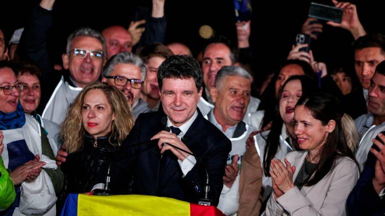 Presidential candidate Nicusor Dan speaks as he reacts to exit polls of Romania's second round of the presidential election, in Bucharest, Romania, May 18, 2025. - REUTERSPIX