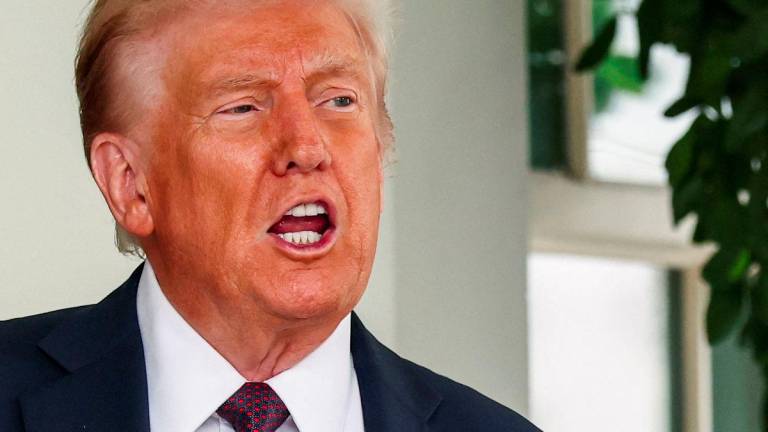 U.S. President Donald Trump reacts as he welcomes Israeli Prime Minister Benjamin Netanyahu (not pictured) at the White House in Washington, D.C., U.S., September 29, 2025. - REUTERSPIX