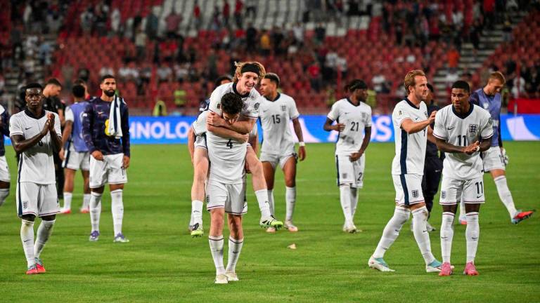 England players celebrate after winning the 2026 FIFA World Cup European Qualifiers Group K football match between Serbia and England, at the Rajko Mitic Stadium in Belgrade, on September 9, 2025. - AFPPIX