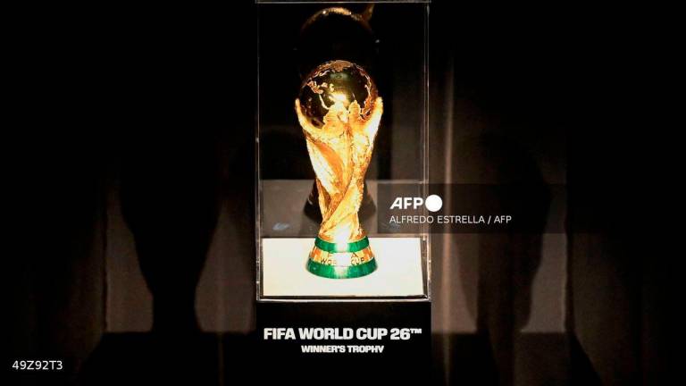 A view of the FIFA World Cup trophy during the unveiling of the countdown clock for the 2026 World Cup in Mexico City, on June 11, 2025. - AFP