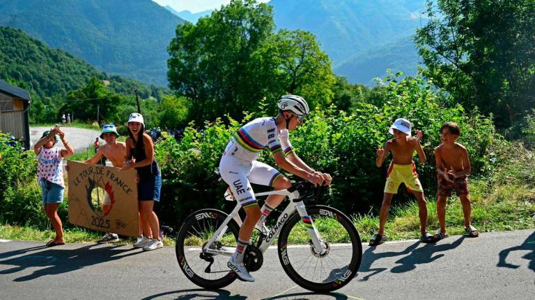 UAE Team Emirates - XRG team’s Slovenian rider Tadej Pogacar cycles in the ascent of Hautacam during the 12th stage of the 112th edition of the Tour de France cycling race, 180.6 km between Auch and Hautacam, in the Pyrenees mountains of southwestern France, on July 17, 2025. Photo by Loic VENANCE / AFP