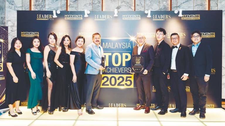 NCT Group’s management and staff commemorate the company’s achievement at the Malaysia Top Achievers Awards 2025.