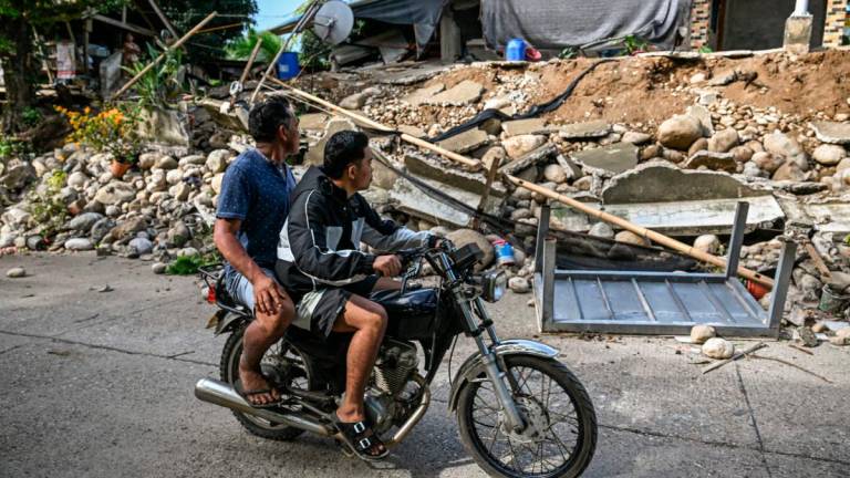 (Photo by Jam STA ROSA / AFP)