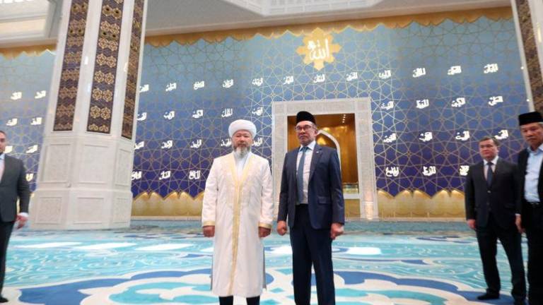Prime Minister Datuk Seri Anwar Ibrahim take a photo session with Chief Mufti of the mosque Nauryzbai Taganuly Optenov who is also Chairman of the Spiritual Administration of Muslim of Kazakhstan (MUFTYAT) during his visiting the Astana Grand Mosque located along the historic Silk Route today. - fotoBERNAMA