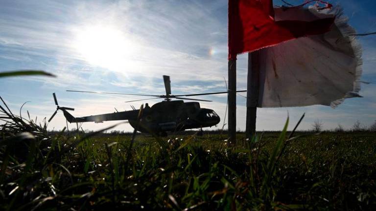 A Mi-8 military helicopter takes off during a training flight at an undisclosed location in Lviv region on November 7, 2024, amid the Russian invasion of Ukraine. - AFPPIX