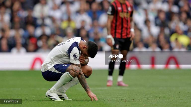 Tottenham Hotspur's Argentinian defender #17 Cristian Romero reacts during the English Premier League football match between Tottenham Hotspur and Bournemouth at the Tottenham Hotspur Stadium in London, on August 30, 2025. - AFP