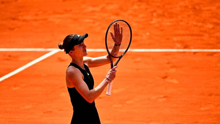 Ukraine’s Elina Svitolina celebrates after winning against Italy’s Jasmine Paolini during their women’s singles match on day 8 of the French Open tennis tournament on Court Philippe-Chatrier at the Roland-Garros Complex in Paris on June 1, 2025. (Photo by JULIEN DE ROSA / AFP)
