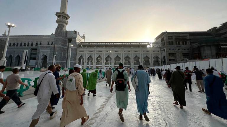 Muslim worshippers walk at the Grand Mosque complex in the holy city of Mecca on June 2, 2025 ahead of the annual Hajj pilgrimage. (Photo by AFP)