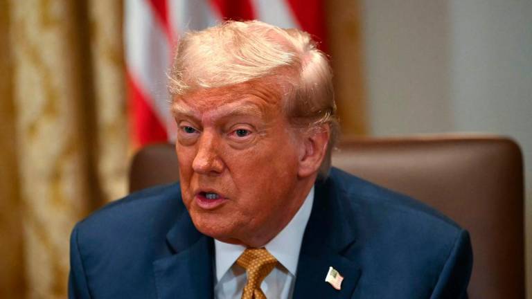 US President Donald Trump speaks during a cabinet meeting in the Cabinet Room of the White House in Washington, DC, on July 8, 2025. (Photo by ANDREW CABALLERO-REYNOLDS / AFP)