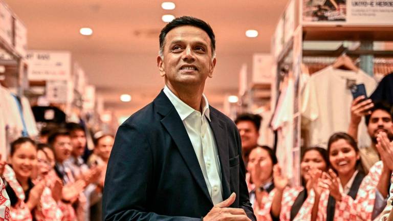 Rahul Dravid, former Indian cricketer, looks on during the store launch of Japanese retail store UNIQLO at Orion Mall in Bengaluru, August 29, 2025. - AFP