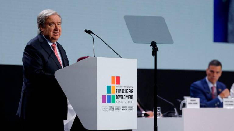 United Nations Secretary-General Antonio Guterres delivers his opening speech during the United Nations 4th International Conference on Financing and Development in Seville, on June 30, 2025. (Photo by Pierre-Philippe MARCOU / AFP)