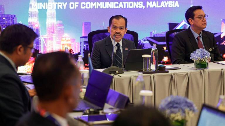 Communications Ministry secretary-general Datuk Seri Mohamad Fauzi Md Isa speaks at the 10th ASEAN Senior Officials’ Meeting Responsible for Information Working Group on Information, Media and Training (10th ASEAN SOMRI WG-IMT) at a hotel today. Also present is Communications Ministry deputy secretary-general (Strategic Communications and Creative Industry) Nik Kamaruzaman Nik Husin. - BERNAMA
