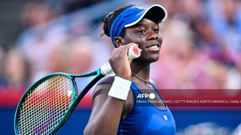 Victoria Mboko of Canada reacts against Coco Gauff of the United States during their fourth round singles women’s match on Day Seven of the WTA 1000 National Bank Open at IGA Stadium on August 2, 2025 in Montreal, Quebec, Canada. (Photo by Minas Panagiotakis / GETTY IMAGES NORTH AMERICA / Getty Images via AFP)