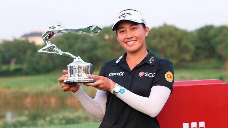 Jeeno Thitikul with trophy — Getty Images