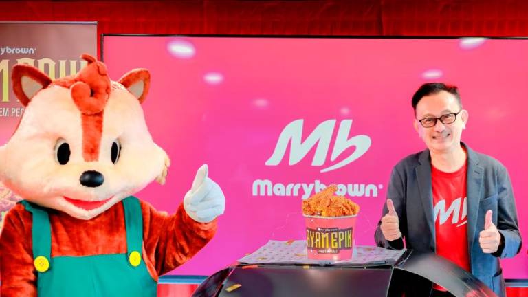 Chan and Marrybrown mascot ‘Brownnie’ launching Ayam Epik.