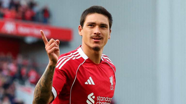 Darwin Nunez celebrates scoring the team’s second goal during the first of two pre season friendly football matches between Liverpool and Athletic Bilbao at Anfield in Liverpool, north west England on August 4, 2025. (Photo by Darren Staples / AFP)