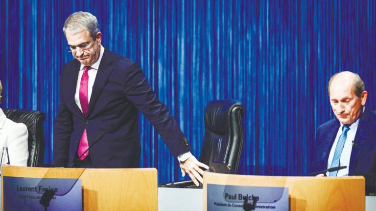 Freixe (left) and Nestle chairman Paul Bulcke attend a general shareholders meeting of Nestle on April 16. The Swiss food giant announced on Sept 1 it had dismissed Laurent Freixe as CEO with immediate effect over an “undisclosed romantic relationship with a direct subordinate”. – AFPPIX