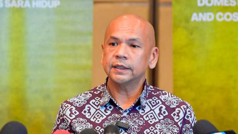 Menteri Perdagangan Dalam Negeri dan Kos Sara Hidup Datuk Armizan Mohd Ali - fotoBERNAMA