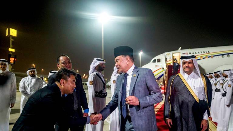 Prime Minister Datuk Seri Anwar Ibrahim arrived here at 9.30 pm local time (2.30 am, 15 Sept - Malaysia) and was accorded a Guard of Honour by the Qatar Amiri Guard before being welcomed by Qatar’s Deputy Prime Minister and Minister of State for Defence Affairs Sheikh Saoud bin Abdulrahman Al Thani. Also present were Malaysia’s Foreign Minister Datuk Seri Mohamad Hasan and Malaysian Ambassador to Qatar Faizal Razali. Anwar is scheduled to deliver Malaysia’s national statement at The Extraordinary Arab-Islamic Summit tomorrow. - BERNAMA