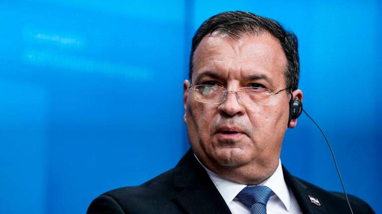 Croatia’s Minister of Health Vili Beros. (Photo by Kenzo TRIBOUILLARD / AFP)