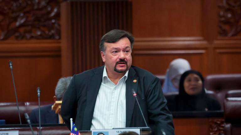 Second Finance Minister, Datuk Seri Amir Hamzah Azizan, during the Second Meeting of the Fourth Session of the 15th Parliament at the Dewan Negara sitting in the Parliament Building today. – BERNAMA