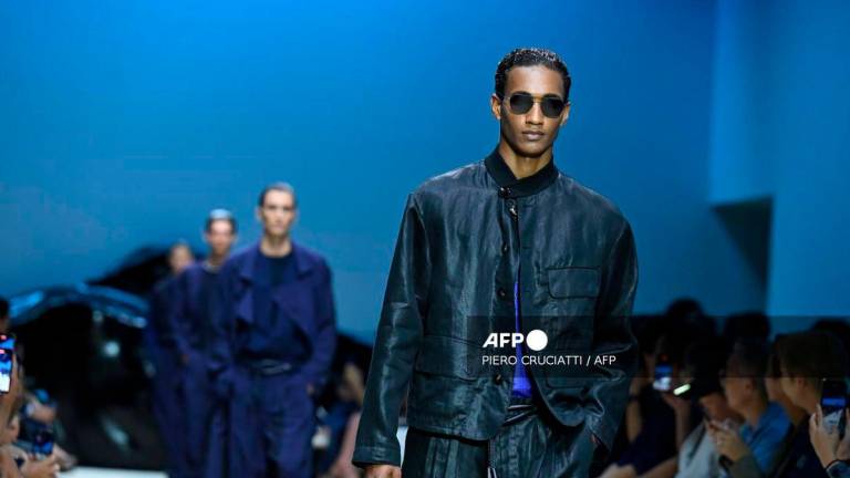 A model walks the runway during the Giorgio Armani collection show at Milan's Fashion Week Menswear Spring / Summer 2026, on June 23, 2025 in Milan. - AFP