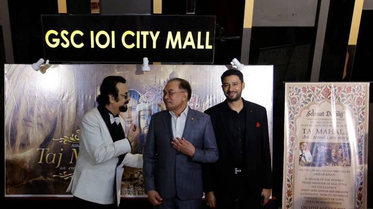 Prime Minister Datuk Seri Anwar Ibrahim attended an exclusive screening of the film Taj Mahal at a shopping mall today. Also present was the film’s director, Akbar Khan (left). – BERNAMA