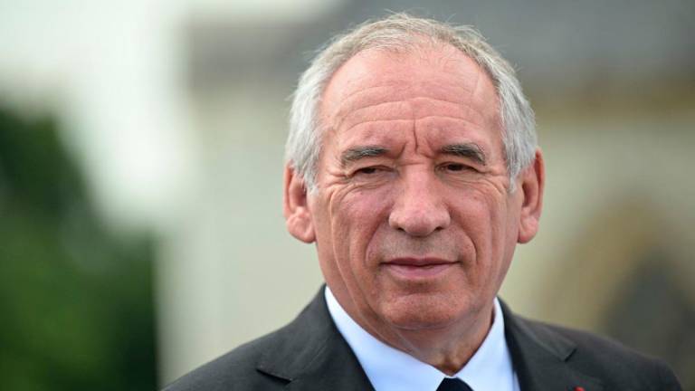 France’s Prime Minister Francois Bayrou looks on at the Angers’ castle (chateau d’Angers), during a visit in Angers, western France, on July 24, 2025. (Photo by Damien MEYER / AFP)