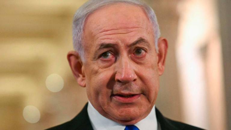 Israeli Prime Minister Benjamin Netanyahu speaks to the press after meeting with US Speaker of the House Mike Johnson at the US Capitol in Washington, DC, on July 8, 2025. (Photo by Jim WATSON / AFP)